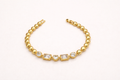 Elegant gold bracelet with sparkling stones
